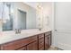 Bathroom featuring dual sinks, modern fixtures, and a large mirror at 362 Warm Wind Dr, Clayton, NC 27527