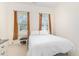 Cozy bedroom with chair, plush carpet and lots of natural light at 362 Warm Wind Dr, Clayton, NC 27527