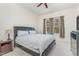 This bedroom offers soft natural light, a ceiling fan and is ready to be decorated to your tastes at 362 Warm Wind Dr, Clayton, NC 27527