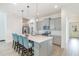 Modern kitchen featuring a center island with bar stool seating and pendant lighting at 362 Warm Wind Dr, Clayton, NC 27527