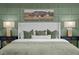 Beautiful bedroom features stylish bedding, and a decorative accent wall at 3625 Bailey Lake Dr, Fuquay Varina, NC 27526