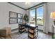 Stylish home office with natural light, custom trim, and black desk at 3625 Bailey Lake Dr, Fuquay Varina, NC 27526