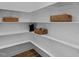 Spacious pantry offering plenty of shelving for storage and organization at 3625 Bailey Lake Dr, Fuquay Varina, NC 27526