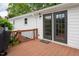 Private outdoor deck with access via double doors, perfect for relaxing or entertaining at 3627 Nc 57, Hillsborough, NC 27278