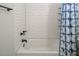 Bathroom features tile wall and shower curtain at 3627 Nc 57, Hillsborough, NC 27278