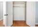 Spacious closet with shelving and wood floors offers ample storage space at 3627 Nc 57, Hillsborough, NC 27278