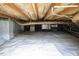 Clean crawlspace with a white vapor barrier, exposed ductwork, and well-organized pipes at 3627 Nc 57, Hillsborough, NC 27278
