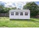 Exterior view of shed showing the windows and green lawn at 3627 Nc 57, Hillsborough, NC 27278