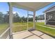 Screened porch offering peaceful outdoor views at 380 Garden Vine Trl, Raleigh, NC 27610