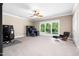 A spacious bedroom offers large windows, great natural light, and a ceiling fan at 3829 Westbury Lake Dr, Raleigh, NC 27603