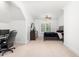 A bedroom offers a cozy sleeping area and a dedicated workspace at 3829 Westbury Lake Dr, Raleigh, NC 27603