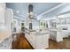 Spacious gourmet kitchen with stainless steel appliances, custom island and beautiful hardwood floors at 3829 Westbury Lake Dr, Raleigh, NC 27603