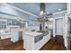Expansive gourmet kitchen featuring stainless steel appliances, double ovens and a functional island at 3829 Westbury Lake Dr, Raleigh, NC 27603
