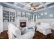 Comfortable living room featuring built-in bookshelves, fireplace, and ample seating at 3829 Westbury Lake Dr, Raleigh, NC 27603