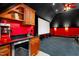 A home theater features a wet bar, snack storage, and a large screen at 3829 Westbury Lake Dr, Raleigh, NC 27603