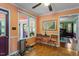 Quaint breakfast nook with orange walls and view of the front porch area at 4953 Tuckahoe Trce, Wake Forest, NC 27587