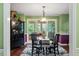 Elegant dining room with decorative furnishings and backyard views at 4953 Tuckahoe Trce, Wake Forest, NC 27587