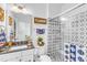 This bathroom features elegant countertops, a shower with glass doors, and modern fixtures at 508 White Oak Branch Ln, Apex, NC 27523