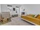 bedroom featuring a comfortable twin bed, a play area, and natural light from large windows at 508 White Oak Branch Ln, Apex, NC 27523