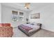 This lovely bedroom features a unique bed and is decorated with a floral chair and carpet at 508 White Oak Branch Ln, Apex, NC 27523