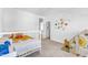 Cozy bedroom featuring a bunk bed, solar system decorations, and a play area at 508 White Oak Branch Ln, Apex, NC 27523