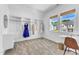 Bright closet offers built-in shelving, a large window, and space for organizing clothes at 508 White Oak Branch Ln, Apex, NC 27523