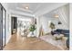 Bright foyer with hardwood floors, staircase, and open access to the living room and dining area at 508 White Oak Branch Ln, Apex, NC 27523
