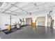 Spacious two car garage featuring epoxy floors and plenty of room for storage at 508 White Oak Branch Ln, Apex, NC 27523