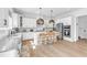 Kitchen offers a large island with seating and stainless steel appliances at 508 White Oak Branch Ln, Apex, NC 27523