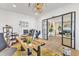 Modern home office with a wooden desk, bright lighting, and stylish decor at 508 White Oak Branch Ln, Apex, NC 27523