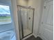 Clean bathroom with glass enclosed walk-in shower at 51 Commons Cir, Clayton, NC 27520