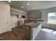 Modern kitchen with granite countertops, stainless steel appliances, and ample cabinet space for storage and functionality at 51 Commons Cir, Clayton, NC 27520