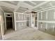 Unfinished room with bare drywall, open doorways, and plenty of potential for customization at 51 Commons Cir, Clayton, NC 27520