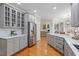 Open kitchen featuring granite countertops, stainless steel appliances, and ample cabinetry at 5102 Highcroft Dr, Cary, NC 27519