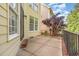 Outdoor patio with iron railing perfect for entertaining with backyard view at 5102 Highcroft Dr, Cary, NC 27519