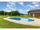 Outdoor in-ground swimming pool with a patio on a sunny day at 5136 Liberty Grove Rd, Liberty, NC 27298
