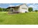 Outdoor shed with garage and screened porch at 5136 Liberty Grove Rd, Liberty, NC 27298