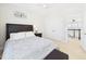 Bright bedroom with ceiling fan, walk-in closet, and ensuite bathroom at 524 Rowanwood Way, Apex, NC 27523