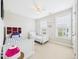 Comfortable bedroom with two twin beds, white walls, and carpeted floors at 524 Rowanwood Way, Apex, NC 27523
