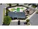 Aerial shot of the neighborhood pool, clubhouse, and playground, highlighting community features at 524 Rowanwood Way, Apex, NC 27523