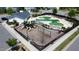 Overhead view of the community playground with slides, swings, and safety surfacing at 524 Rowanwood Way, Apex, NC 27523
