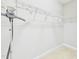 Well-organized walk-in closet with white shelving and storage solutions at 524 Rowanwood Way, Apex, NC 27523