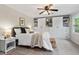 Bedroom with built-in storage, a ceiling fan, and natural light at 5409 Knollwood Rd Rd, Raleigh, NC 27609