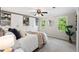 Bedroom with built-in storage, a ceiling fan, and natural light at 5409 Knollwood Rd Rd, Raleigh, NC 27609