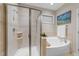 Bathroom featuring shower, tub, and decorative painting at 5644 Wade Park Blvd, Raleigh, NC 27607