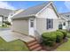 Detached garage with convenient driveway access and well maintained green landscaping at 5644 Wade Park Blvd, Raleigh, NC 27607