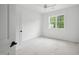 Bedroom with a ceiling fan and a window overlooking the backyard at 60 Purslane Dr, Franklinton, NC 27525