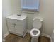 Bathroom featuring modern vanity and toilet at 609 N Magnolia Ave, Dunn, NC 28334