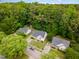 Aerial view of the neighborhood with tree-lined streets and well-manicured lawns at 6321 Lymington Dr, Raleigh, NC 27616