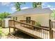 Home exterior showcasing a wooden ramp and backyard at 6321 Lymington Dr, Raleigh, NC 27616